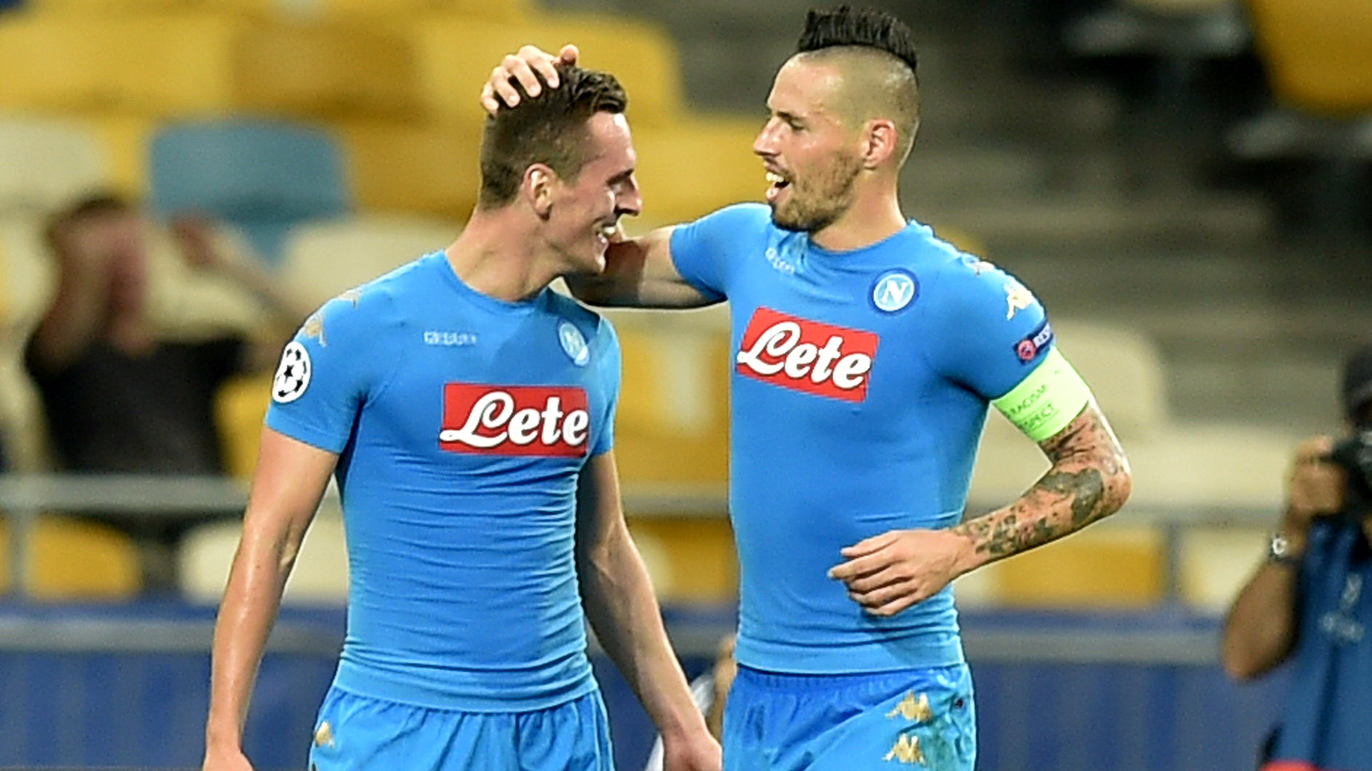 SSC Napoli's Arkadiusz Milik (L ) and Marek Hamsik celebrate after scoring a goal during the UEFA Champions League football match between FC Dynamo and SSC Napoli at the Olympiyski Stadium in Kiev on September 13, 2016.  / AFP / SERGEI SUPINSKY        (Photo credit should read SERGEI SUPINSKY/AFP/Getty Images)